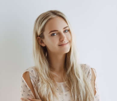 cheerful girl enjoying standing on white backgroun 7S76VQM 2